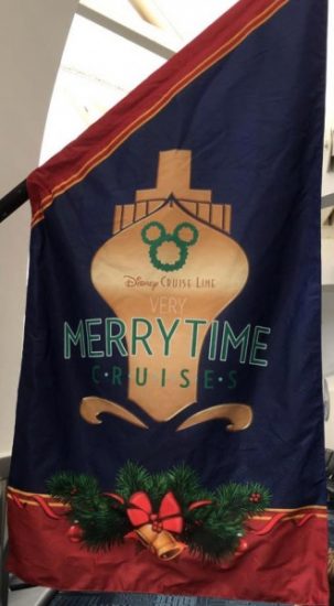 Decorative holiday flags line the walls and show you the way to check-in at the port terminal.