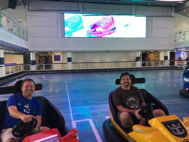 Steve and Ric, agents of The Magic For Less having fun on the bumper cars!