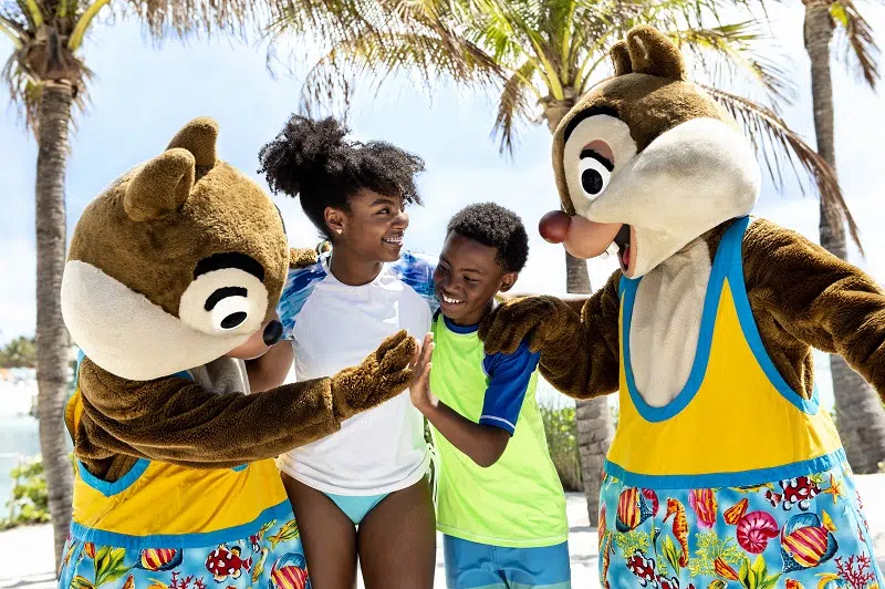 Disney Cruise Line Discounts - Chip and Dale with guests on Castaway Cay